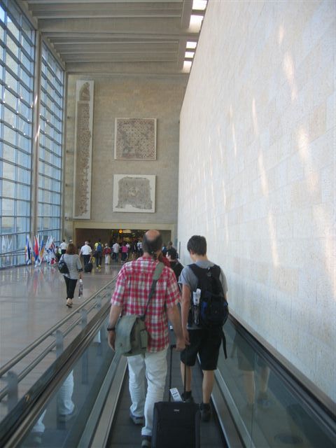 Escalator down to the passport control
